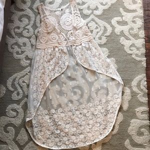 Cream sheer crochet high low vest